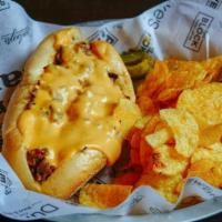 819 Cheesesteak · Thinly sliced ribeye, beer cheese sauce, grilled onion served on a Hoagie.  Choice of side