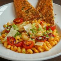 Bang Bang Shrimp Pasta · Marinated Grilled Shrimp, cavatappi, in a Spicy cream sauce, served with garlic toast