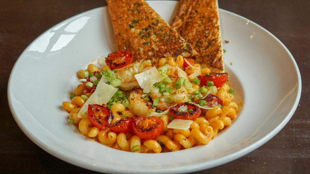 Bang Bang Shrimp Pasta · Marinated Grilled Shrimp, cavatappi, in a Spicy cream sauce, served with garlic toast