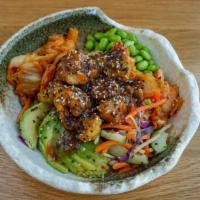 Korean Fried Cauliflower Bowl · Coconut rice, kimchi, daikons, carrots, edamame, avocado, spicy plum sauce
