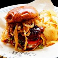 Western Bison Burger · A hand pattied Bison Burger, topped with cherry citrus chipotle BBQ sauce and Crispy onions