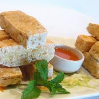 Tofu Tod · Fried tofu served with sweet chili and peanut sauce sides.