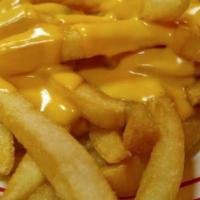 Cheese Fries · Golden crispy fries topped with melted cheddar cheese.