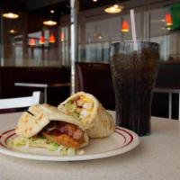 Chicken Bacon Ranch Hani · Premium chicken tenderloins cooked golden brown with bacon, housemade ranch,  American and S...