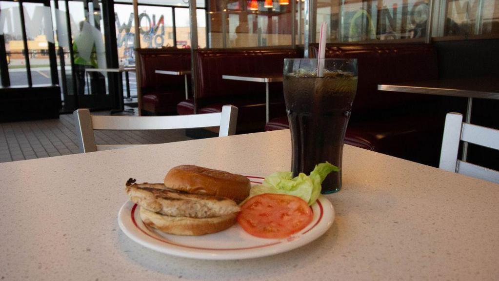 Grilled Chicken Sandwich · A boneless chicken breast seasoned and served on a toasted bun with lettuce and tomato.