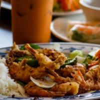 D2— Kim'S Special - Salted Peppered Prawns · Crispy fried prawns, stir-fried with onions and jalapeños. Served with steamed white rice, l...