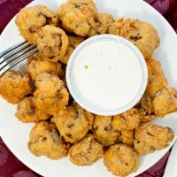 Fried Mushrooms · Hand breaded and flashed fried. Served with ranch or horseradish sauce.