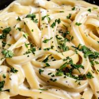 Alfredo · Fettuccine noodles topped with alfredo sauce.