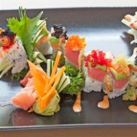 Rainbow Dragon Maki · Shrimp tempura topped with assorted fish and variety of tobiko.