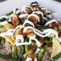 Agra Bowl · sautéed all-natural chicken or tofu, roasted zucchini & squash, thyme asparagus on unfried b...