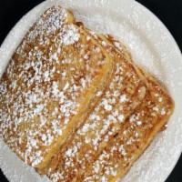 French Toast · Cinnamon French Toast dusted with powdered sugar.