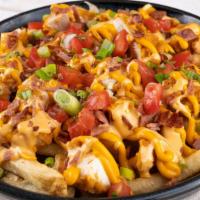 Loaded C.B.R · Our original crispy fries, topped with melted cheese, crispy chicken, turkey bacon, your cho...