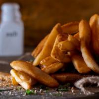 Steak-Cut Fries · Steak-cut French fries, crisped to golden perfection