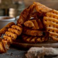Waffle Fries · Waffle-shaped potatoes cooked until crispy on the outside and tender on the inside