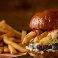 The Lebanese Burger · Lebanese-style juicy 1/2 lb Black Angus beef patty, loaded with fries and coleslaw and toppe...