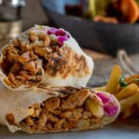 Chicken Shawarma Pita · Thinly sliced boneless chicken marinated with our special spices, topped with our signature ...