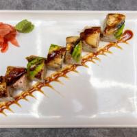 Mia Roll · Tempura shrimp, cucumber topped with crab salad, freshwater eel, avocado and eel sauce.