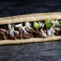 Philly Flatbread · Shredded beef, green peppers, red onions, mozzarella and CE Spicy RanchCALS 358)