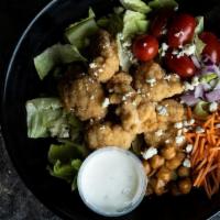 Black & Bleu Chicken Salad · Breaded chicken, romaine, shredded carrots, red onion, cherry tomatoes, roasted chickpeas an...