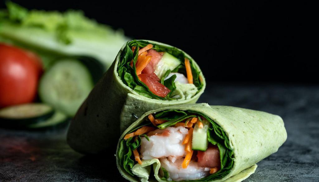 Bang Bang Shrimp Wrap · Served cold. Shrimp, carrots, spinach, tomato, cucumber and CE Sweet Chili sauce in a tomato basil wrap(CALS 486)