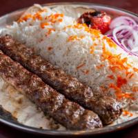 Beef Koubideh On Lavash · Chef's favorite. Two seasoned skewers of your choice of beef koubideh, served on lavash brea...