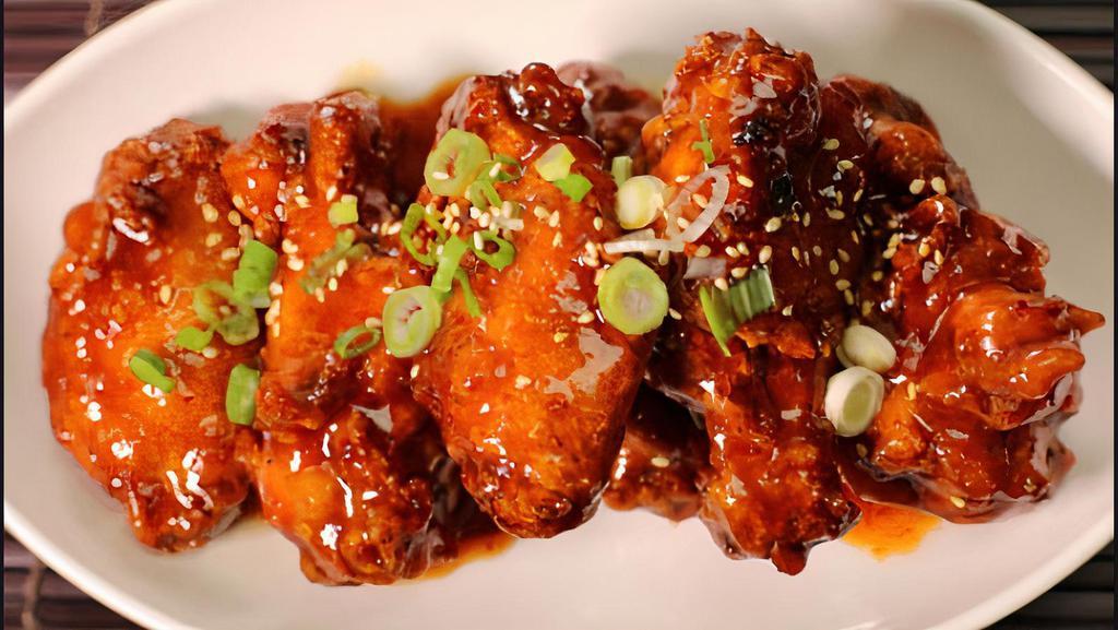 Spicy Wings · Chicken wings coated in our house made spicy wing sauce