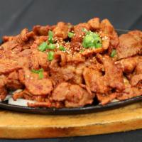 Dwaeji Bulgogi (Pork Bulgogi) · Pork loin marinate with house blend chili pepper paste and grilled to perfection.