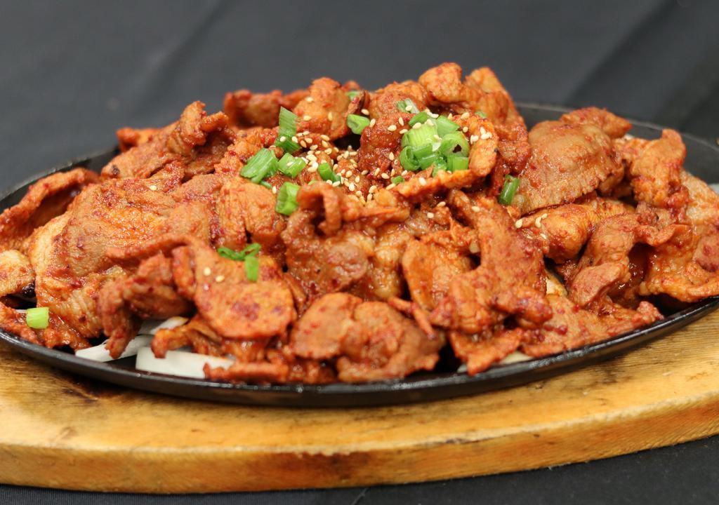 Dwaeji Bulgogi (Pork Bulgogi) · Pork loin marinate with house blend chili pepper paste and grilled to perfection.