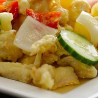 Sweet & Sour Chicken · Tender pieces of all white chicken breast fried in a light batter. Served with fresh vegetab...