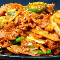 Jeyuk Bokkeum (Pork Stir Fry) · Tender marinated pork, onions, scallions, mushrooms and jalapenos stir fried in a spicy red ...