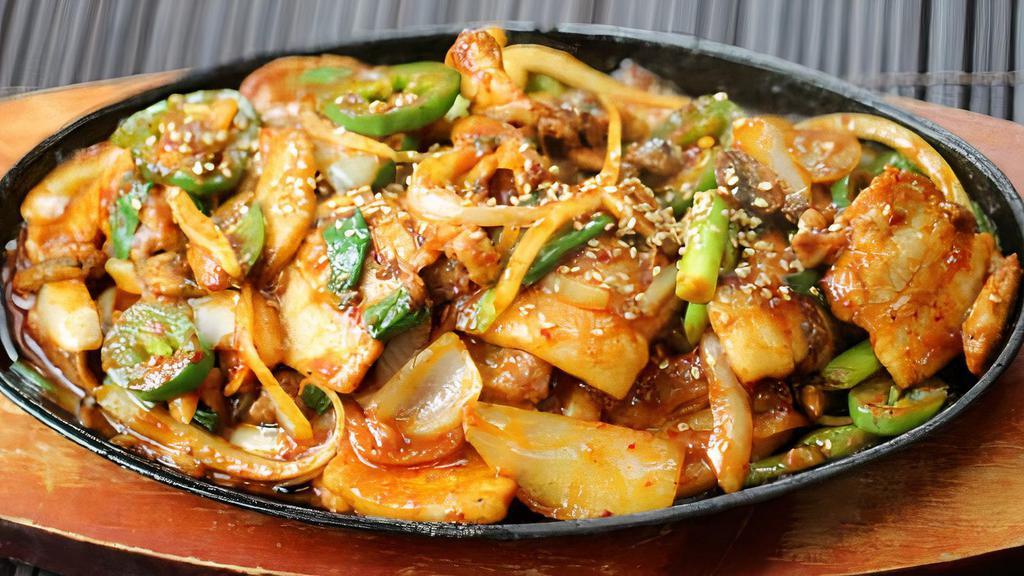 Samgyupsal Bokkeum (Pork Belly Stir-Fry) · Pork belly, zucchini, onions, scallions stir fried in a spicy gochu wine sauce.