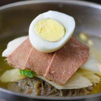 Mul Naeng Myun · Beef brisket, pickled radish, cucumbers slices, jalapenos and hard-boiled egg layered on top...