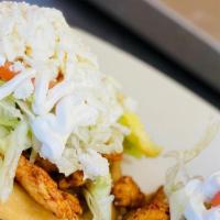 Sopes · A fried masa base with your choice of meat (steak, spicy pork, chicken, shredded beef or spi...