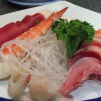 Sashimi Appetizer · 3 pieces tuna 2 pieces salmon and 2 pieces yellowtail.