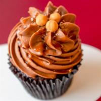Chocolaty Salty Caramel Cupcake · Chocolate cupcake filled with caramel and frosted with chocolate buttercream topped with sea...