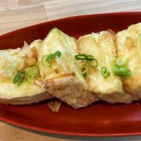 Age Dashi Tofu · 4pcs fried soft tofu with tempura sauce.