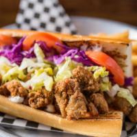 Po Boy · Vegan. Crispy fried oyster mushrooms, red slaw, lettuce, tomato, garlic mayo and louisiana h...