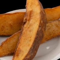 3 Potato Wedges · 3 hand breaded potato wedges