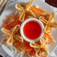 Crab Rangoon (8) · Deep fried wonton with cream cheese and crab meat. Served with sweet and sour sauce.