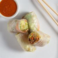 Summer Rolls (2) · Ground chicken and fresh vegetables mixed in a steamed rice paper wrap. Served with Thai pea...