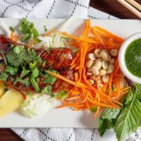 Spices Thai Sausage · Grilled homestyle Thai pork sausage with mixed spices and lemon grass, served with garlic ja...