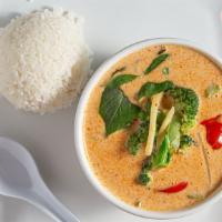 Red Curry Dinner · Thai style red curry stewed in coconut milk with bamboo, peas, bell peppers, and basil