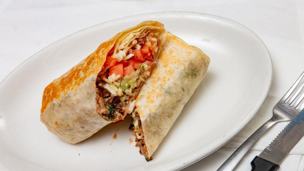 Burrito · Our Huge Flour Tortilla Rolled around your Choice of Meat, Stuffed with Rice, Beans, Lettuce, Cheese, Tomatoes, and Sour cream.