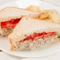 Chicken Salad Sandwich · Homemade chicken salad with pineapple and pecans served on white or cracked wheat bread.