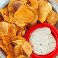 Smoked Onion Dip · DOC's twist on good 'ole onion dip.  Served with house cut chips.