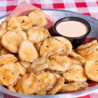 Fried Pickles · House dill pickles in a light batter served with BBQ ranch.