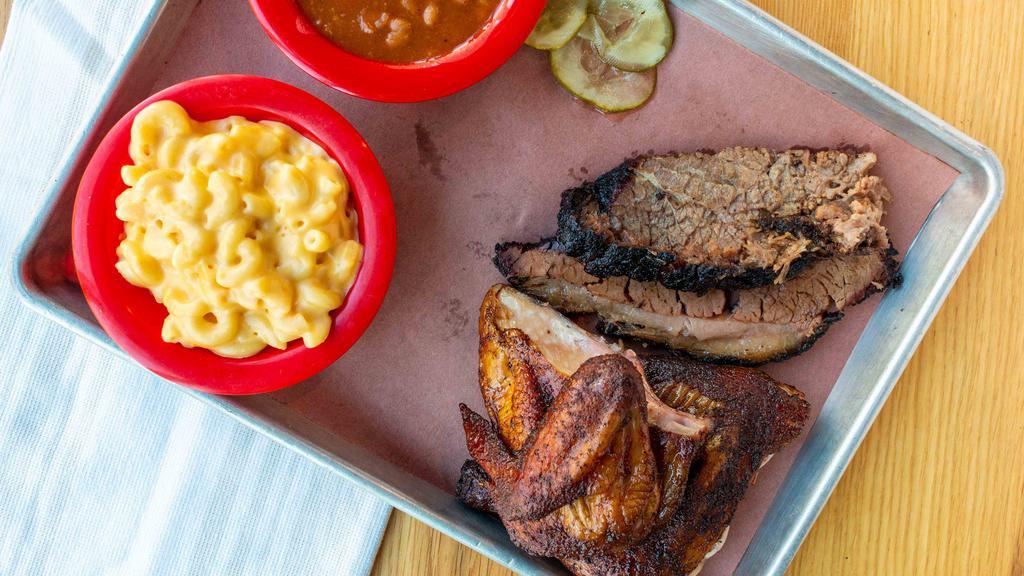 2 Meat Plate · Choose any two of our hickory smoked meats and your choice of two sides.