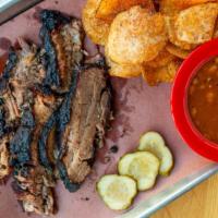 Brisket Plate · Sliced hickory smoked beef brisket and your choice of two sides.