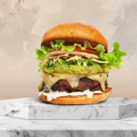 Guac Me Out Burger · American beef patty topped with guacamole, jalapenos, lettuce, tomato, onion, and melted che...