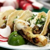 Tacos · Made with your choice of meat on handmade soft corn tortilla. All tacos are garnished with c...